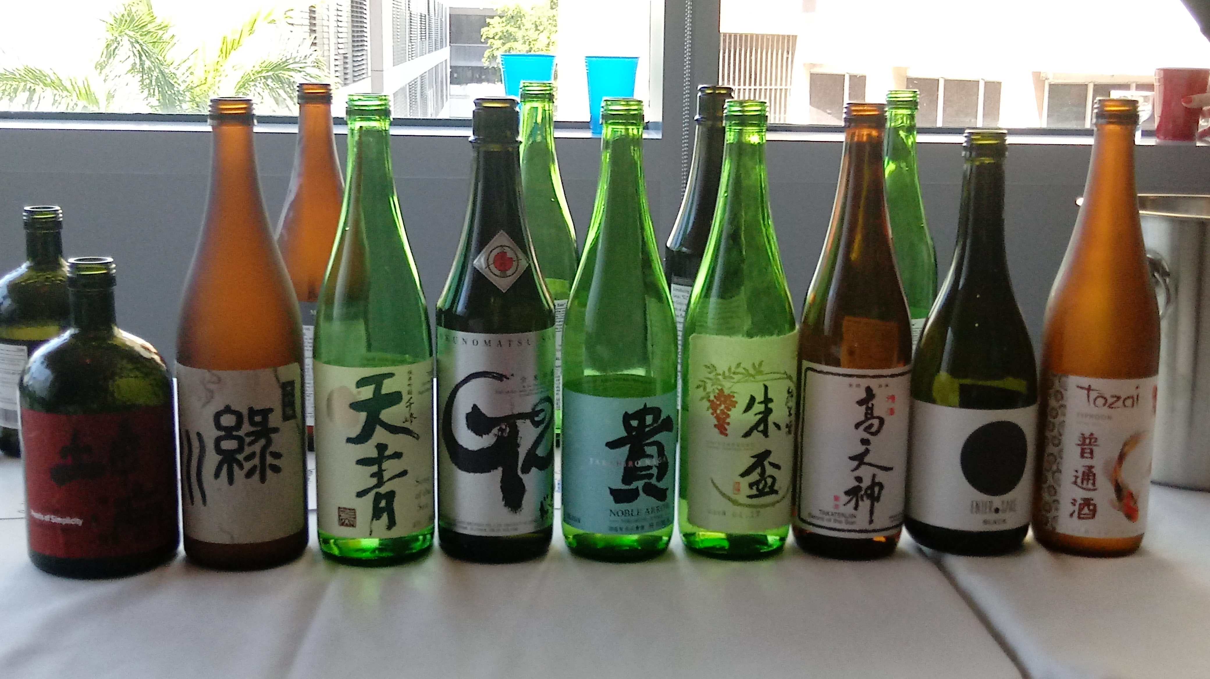 Photo of numerous sake bottles